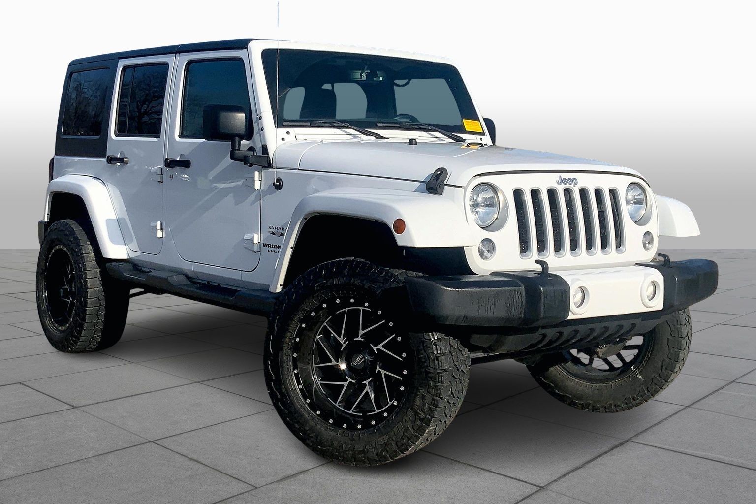 Used 2016 Jeep Wrangler Unlimited Sahara with VIN 1C4BJWEG8GL143477 for sale in Kansas City