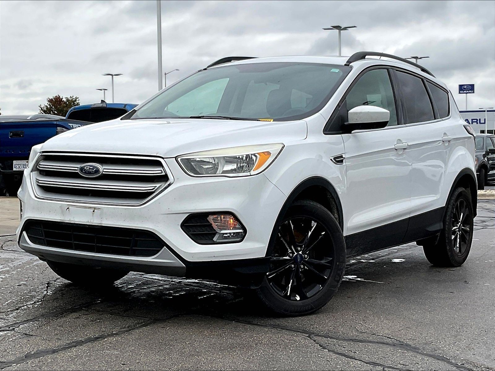 Used 2018 Ford Escape SE with VIN 1FMCU9GD9JUA11261 for sale in Janesville, WI