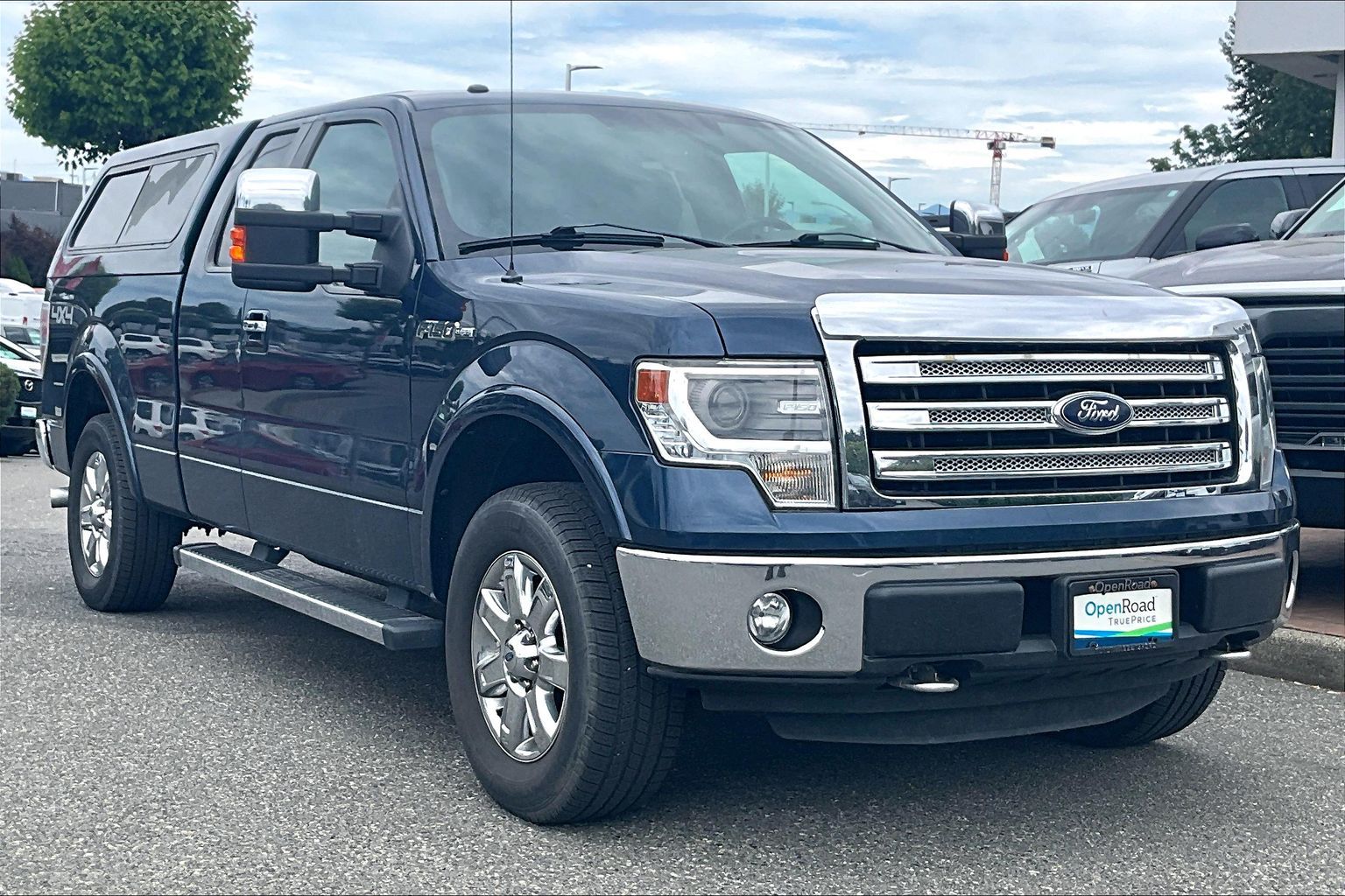 Blue 2013 Ford F-150 Lariat SuperCab 4WD Pickup Truck Four-Wheel Drive