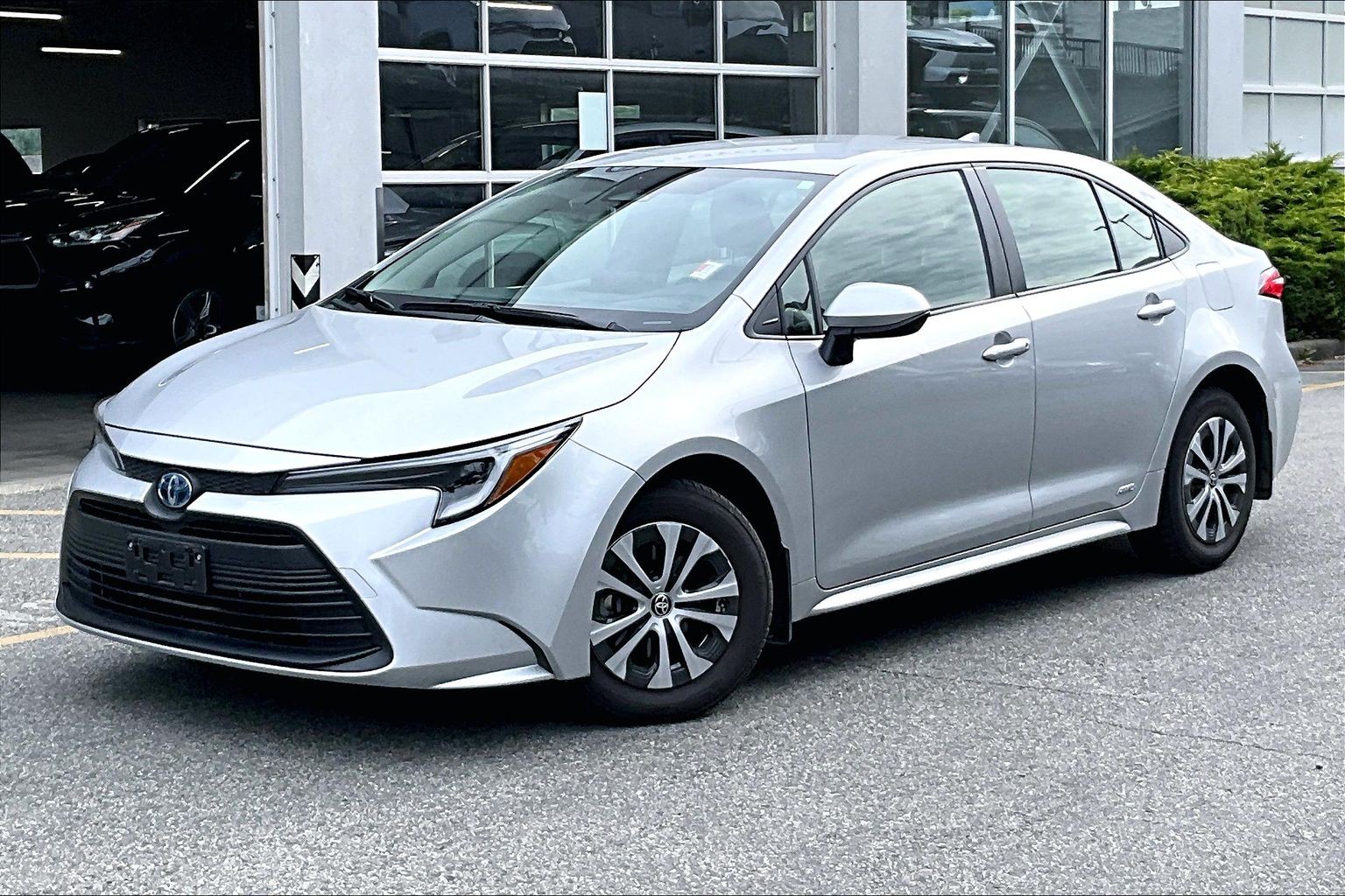 Classic Silver Metallic 2024 Toyota Corolla Hybrid LE AWD Sedan All-Wheel Drive Automatic