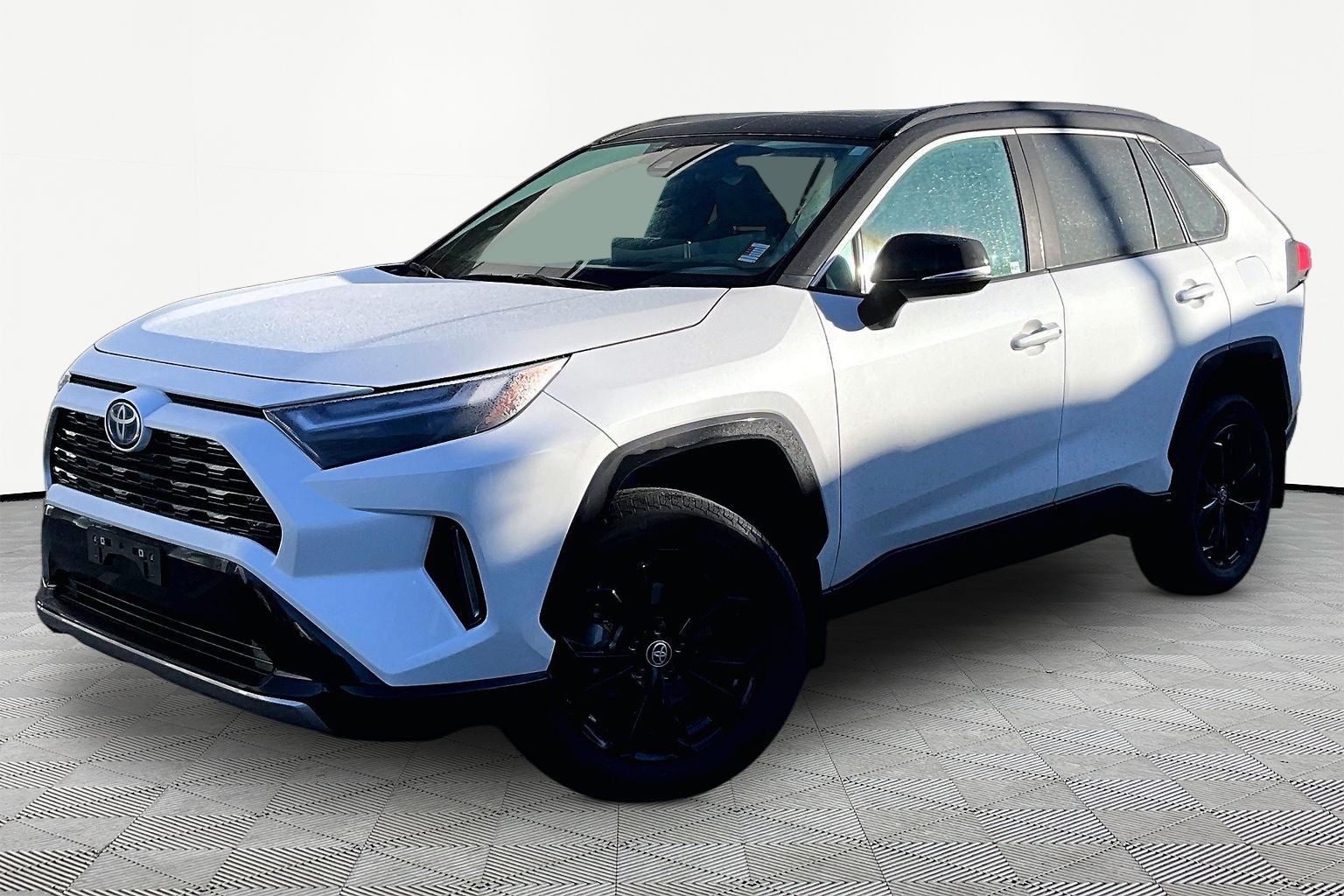 Wind Chill Pearl w/ Black Roof 2024 Toyota RAV4 Hybrid SUV / Crossover All-Wheel Drive Automatic